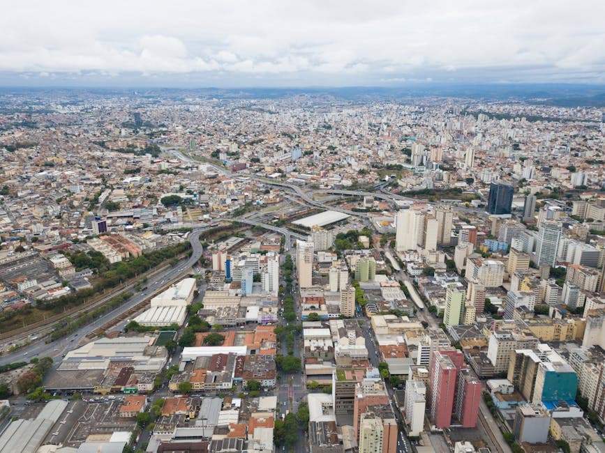 Panoramic aerial view of downtown Belo Horizonte, capturing the dense urban landscape and skyline.