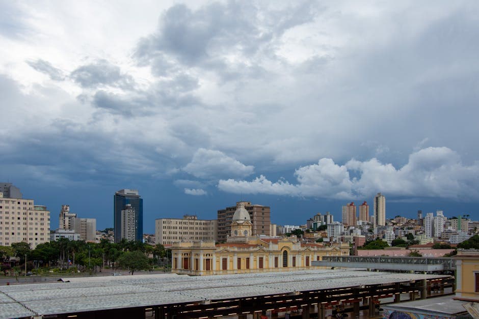 Captivating cityscape of Belo Horizonte featuring diverse architecture under a dramatic cloudy sky.