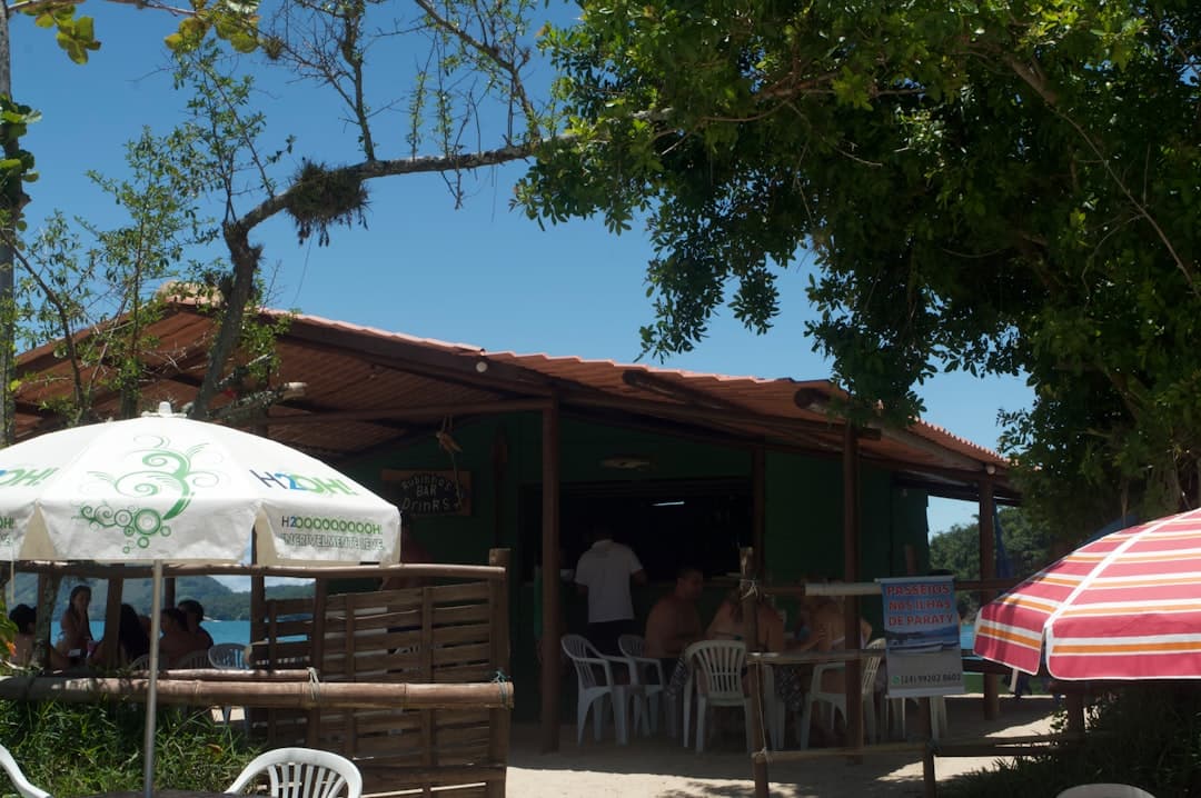 Beachside cafe with umbrellas and tables