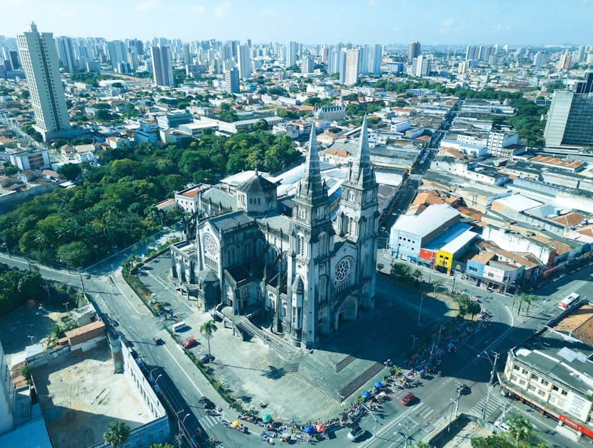 Stunning aerial view of the Metropolitan Cathedral amidst Fortaleza cityscape, Brazil.