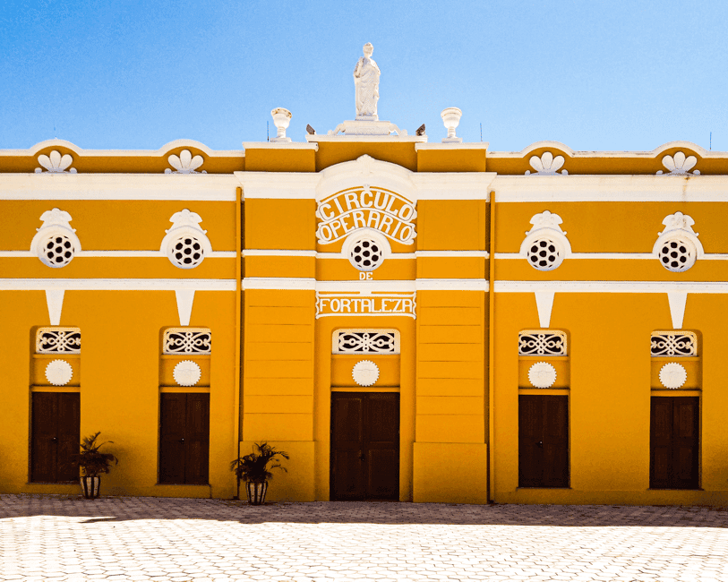 Beautiful yellow facade of Círculo Operário, a historic building in Fortaleza, Brazil.