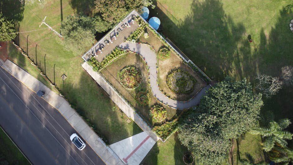 Aerial view of a rooftop garden with winding pathways in Camobi, Brazil.