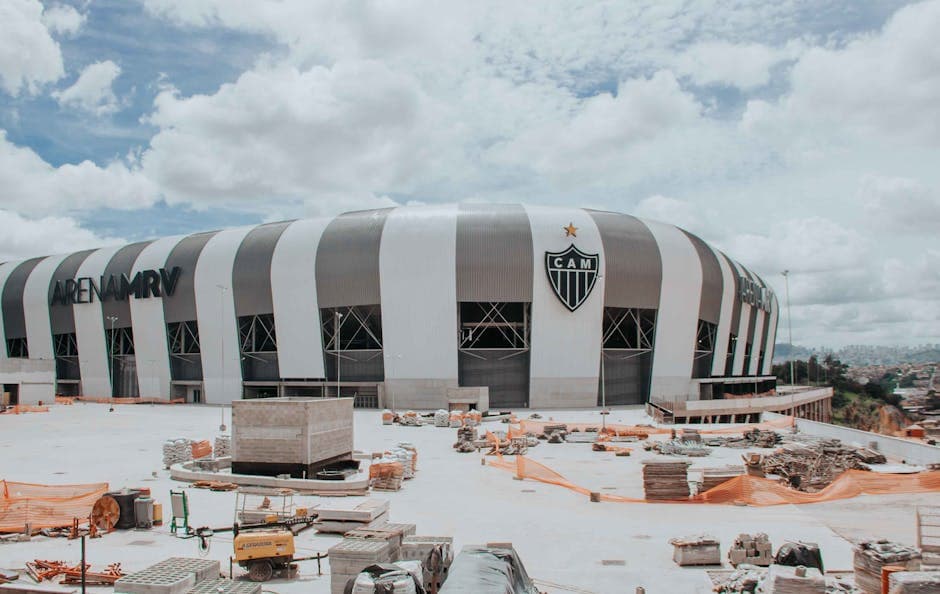 Aerial view of the Arena MRV stadium in Belo Horizonte under construction, showcasing modern architecture.