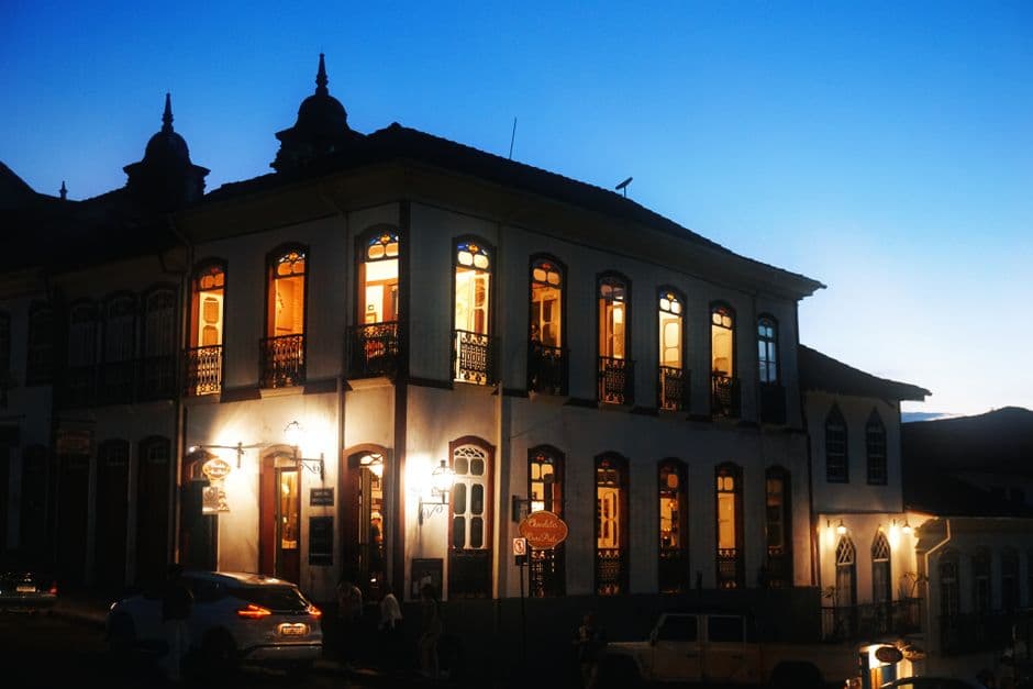 A captivating twilight view of a historic building in Ouro Preto, Brazil, showcasing colonial architecture.