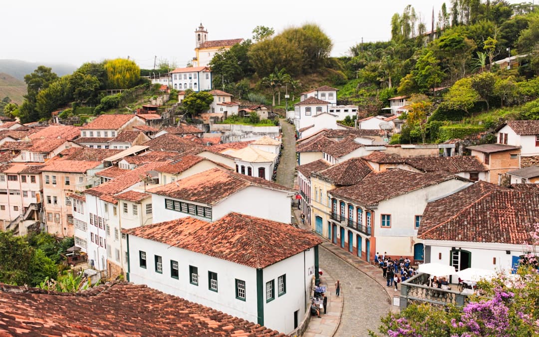 Historic colonial town with red-tiled roofs and church