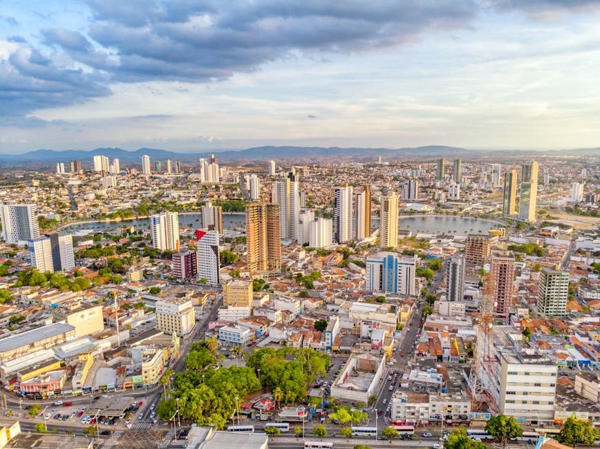 Panoramic aerial view of Centro, Brazil showcasing skyscrapers and urban landscape at daytime.