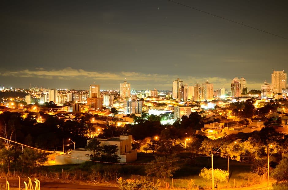 Stunning view of Sao Paulo's cityscape at night, showcasing bright city lights and modern architecture.