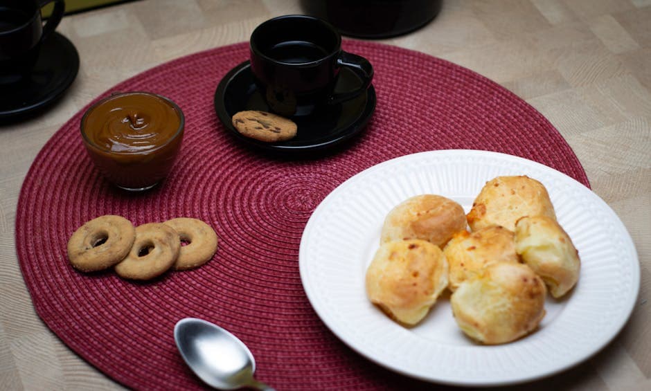 A cozy setup with coffee, pão de queijo, and dulce de leche in São Paulo.