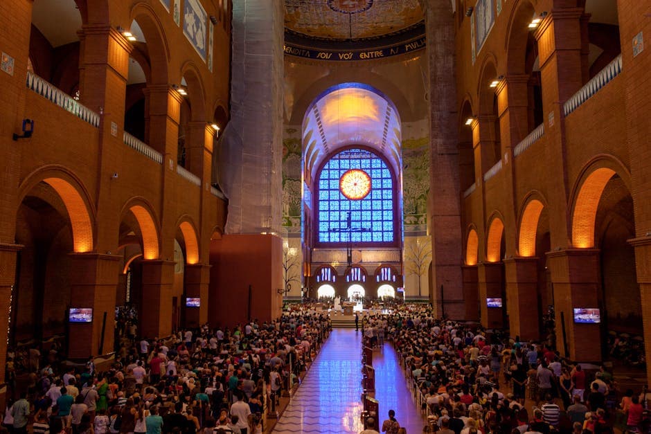 A vibrant scene inside Brazil's renowned Basilica of Aparecida during mass.