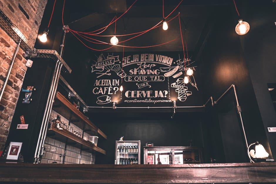 Modern café interior with artistic chalkboard, cozy vibes, and ambient lighting.