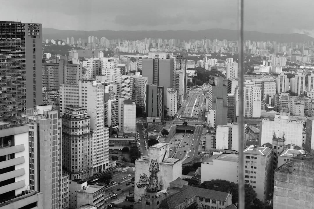 Aerial view of a sprawling cityscape with tall buildings.
