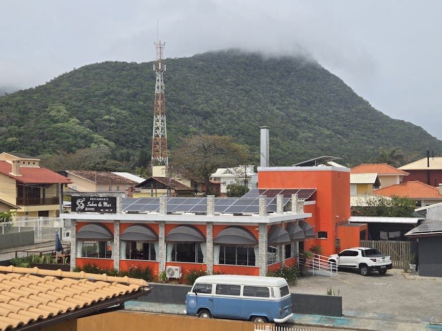 Picturesque restaurant with solar panels and mountain view, rural charm.