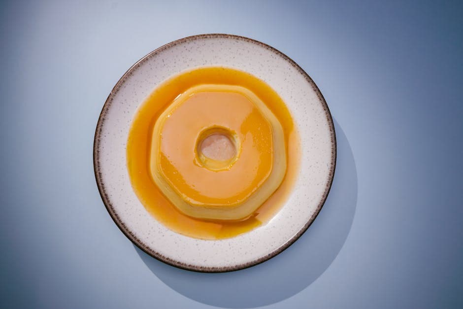 A delicious Brazilian flan on a white plate, perfect for food photography and culinary websites.