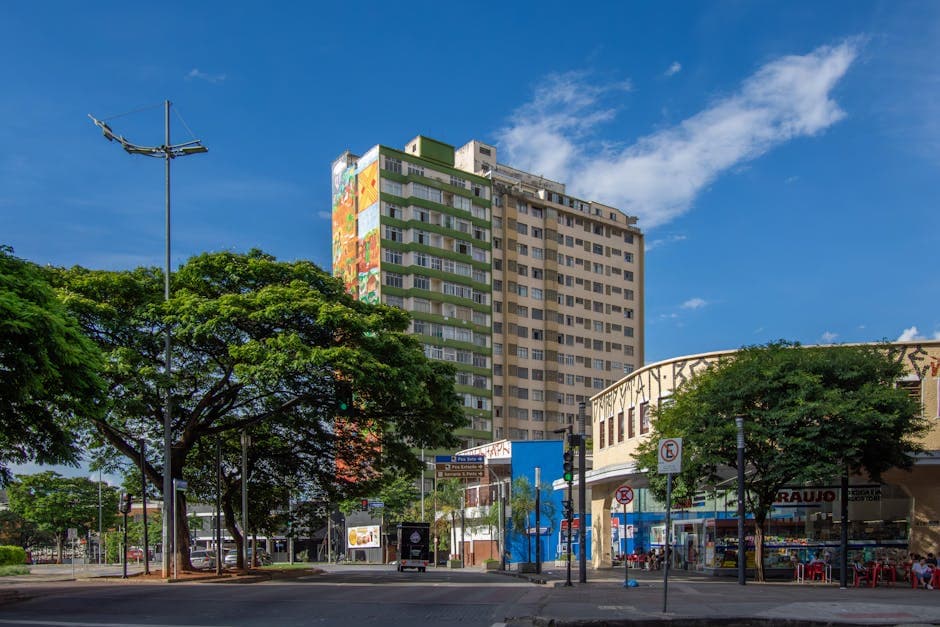Colorful building in Belo Horizonte, Brazil, under a clear blue sky, capturing urban life.