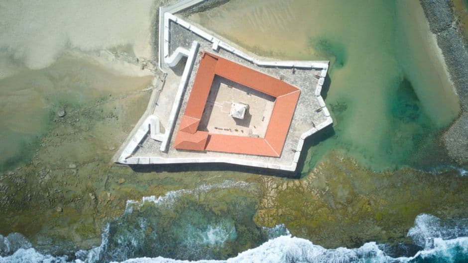 Stunning aerial view of historic fortress on Brazil's Atlantic shore in Rio Grande do Norte.