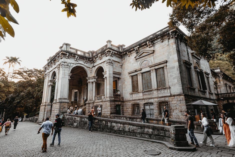 Explore the historic facade and bustling ambiance of Parque Lage in Rio de Janeiro, Brazil.
