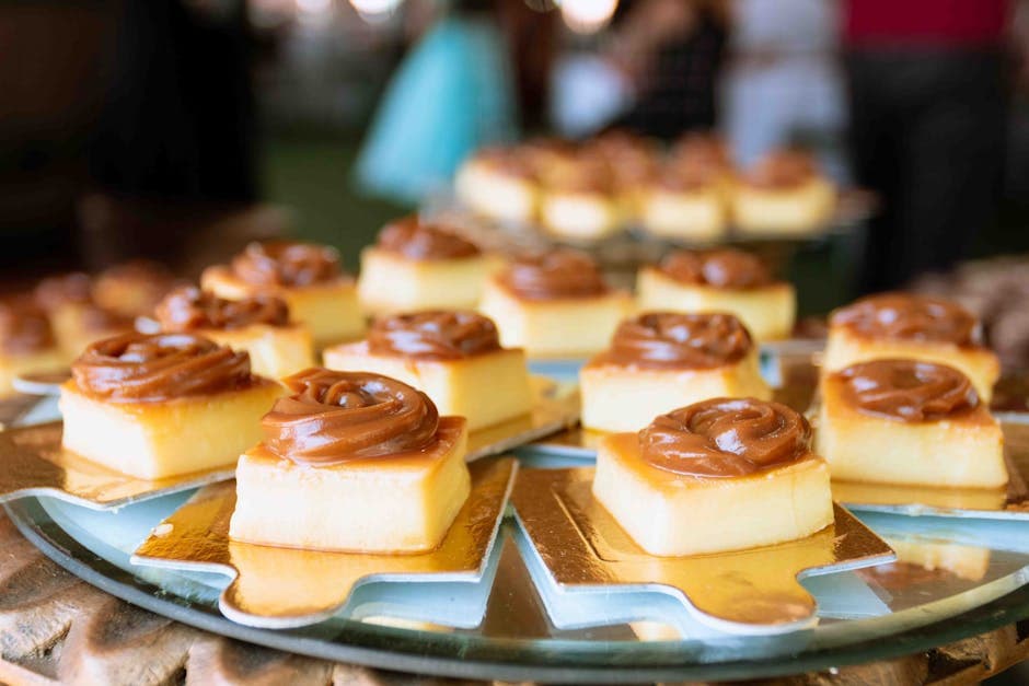 A close-up of traditional Brazilian Brigadeiro desserts beautifully arranged on a table.