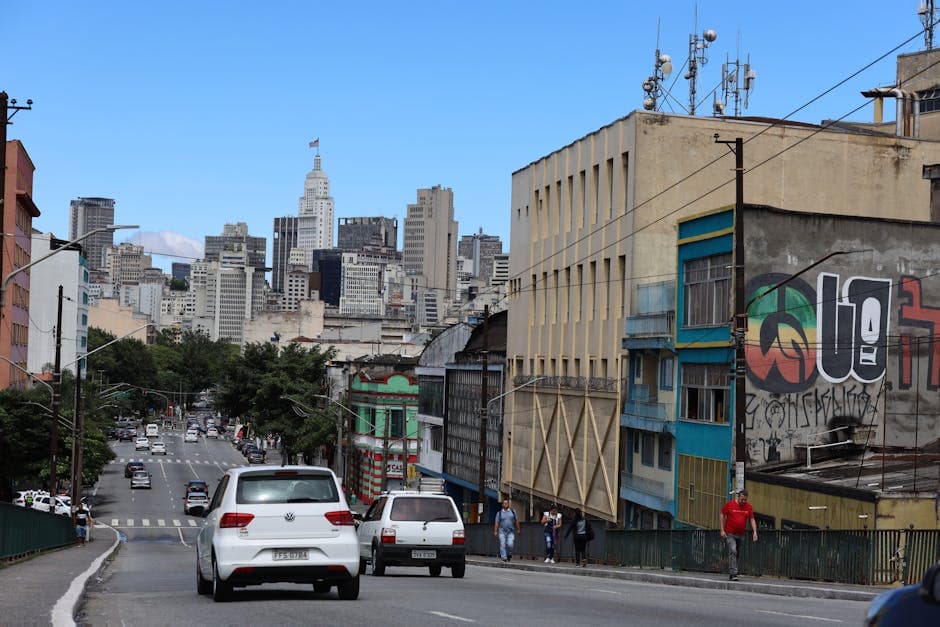 Dynamic cityscape of Sao Paulo featuring urban street and iconic skyline.