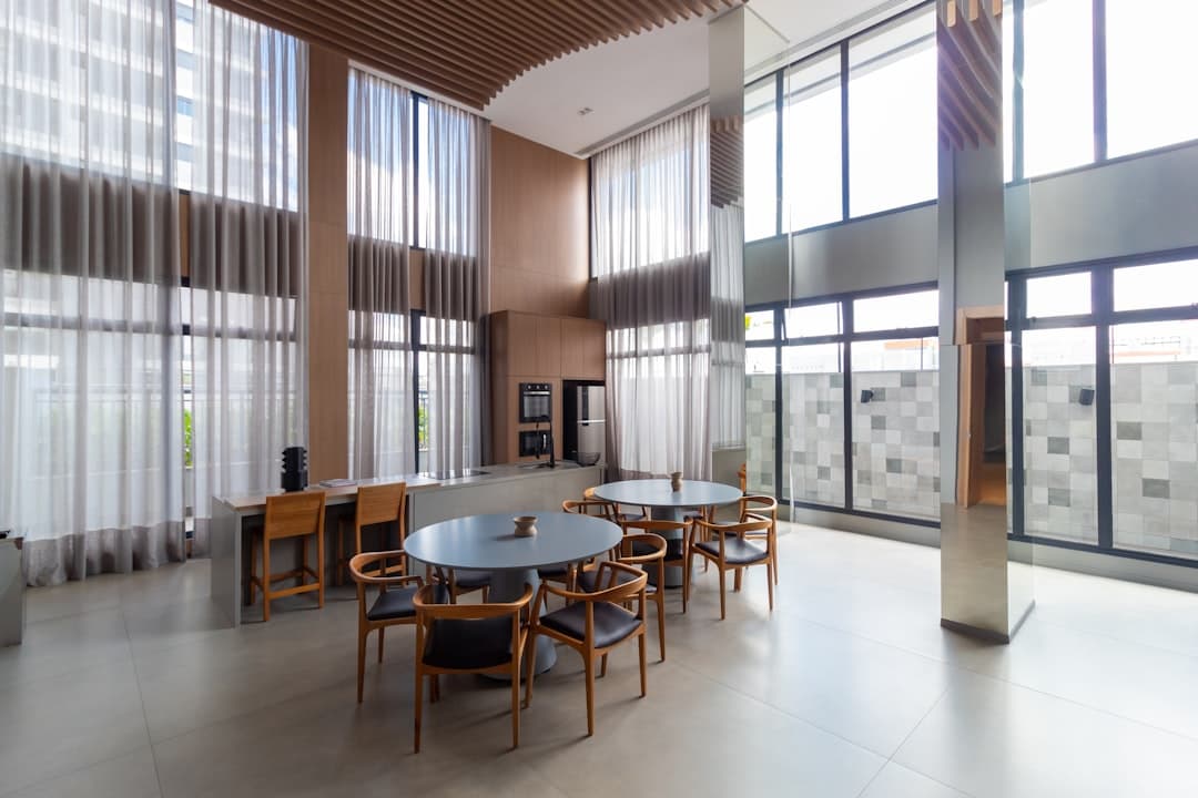 a room with tables and chairs