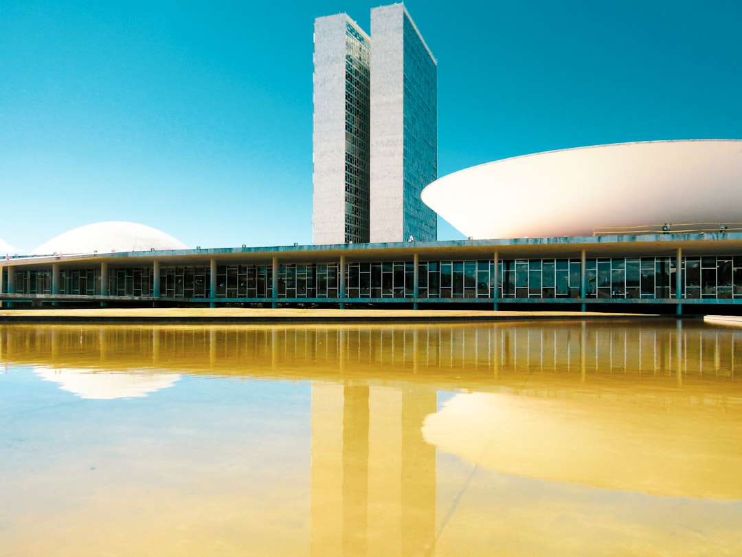 white and brown concrete building under blue sky during daytime