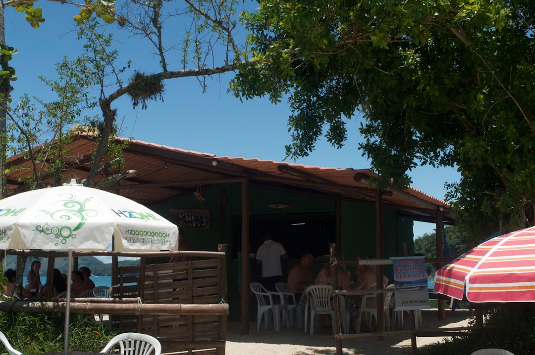 Beachside cafe with umbrellas and tables
