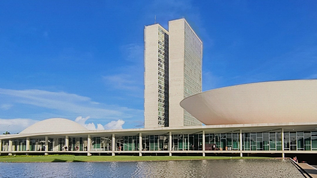 Modern government building with curved roof and tower