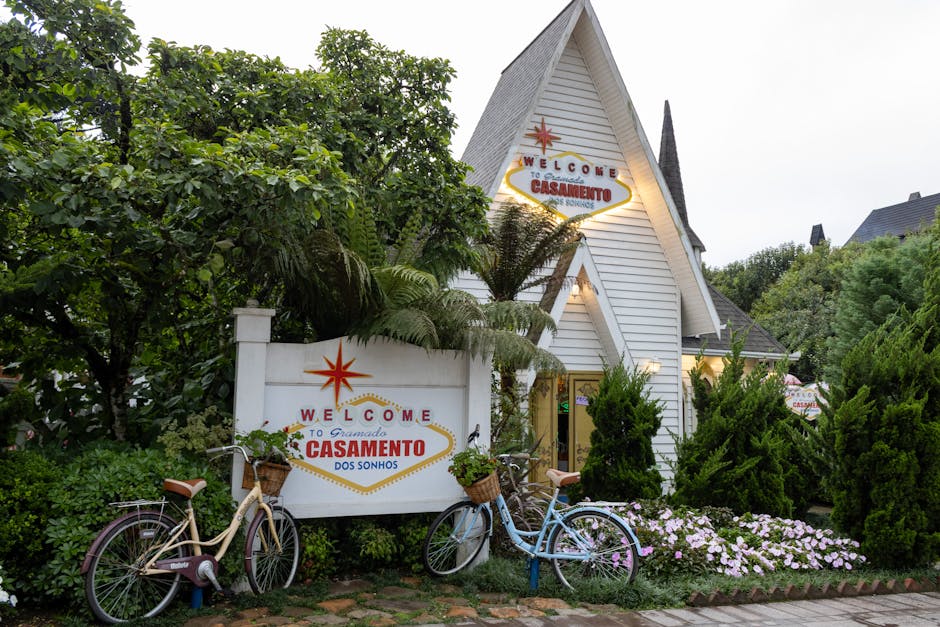 A picturesque wedding venue in Gramado with vintage bicycles and lush greenery.