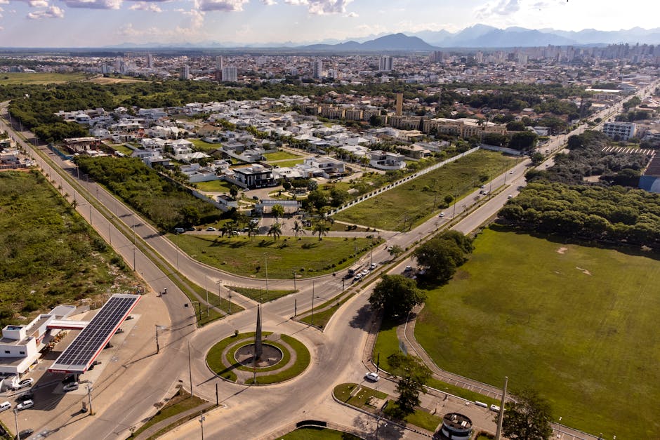 Stunning aerial view of Campos dos Goytacazes, Brazil, showcasing urban and green landscapes.