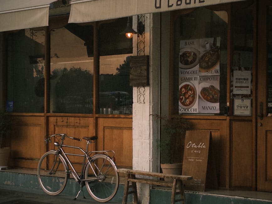 Vintage-style Korean cafe in Seoul with a bicycle parked outside.