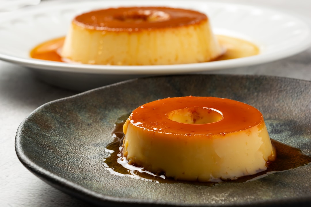 two plates with desserts on them on a table