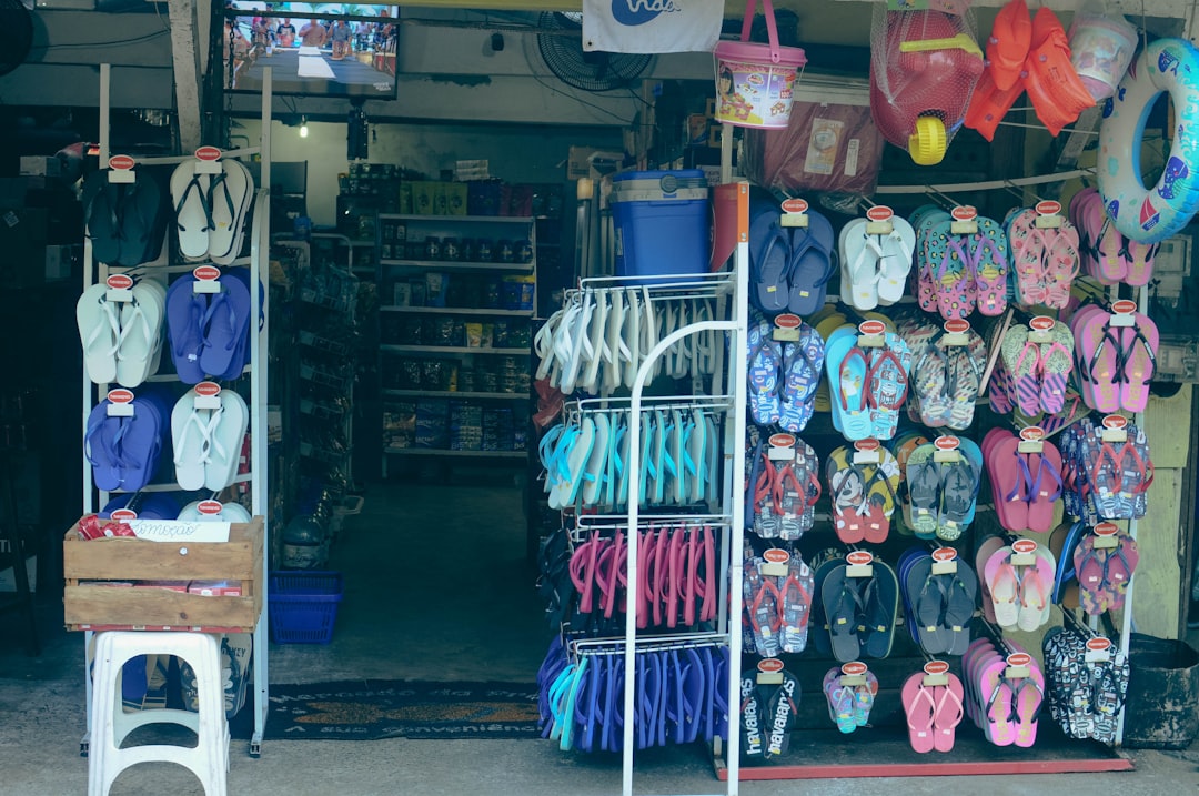 a store with a variety of sandals and sandals for sale