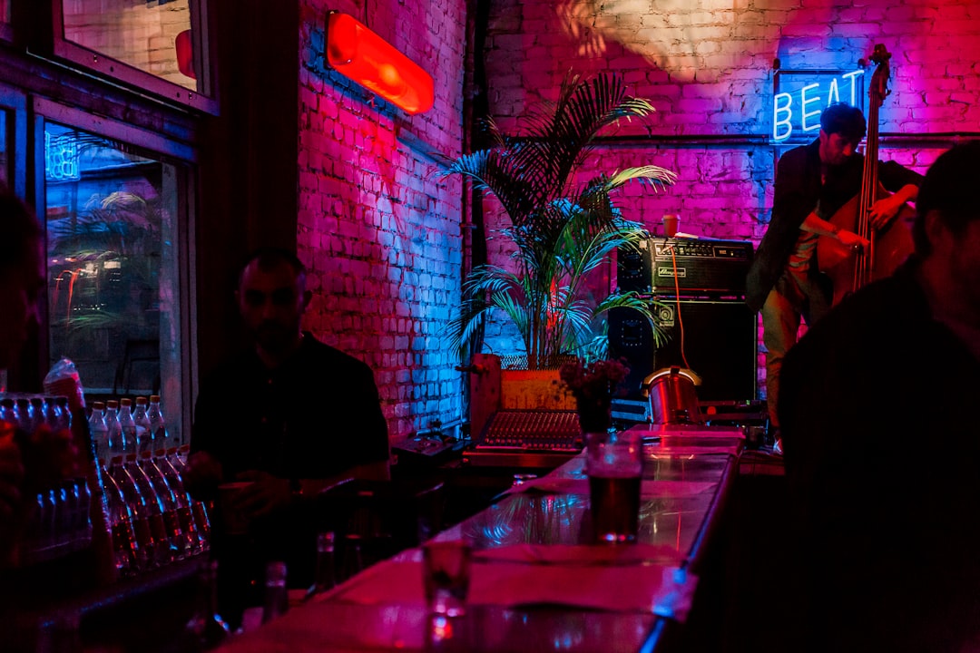 a group of people sitting at a table with drinks